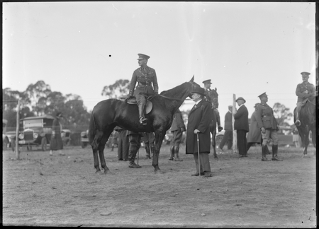 Royal Visit, May 1927. Mounted Army officer with civilian in bowler hat and frock coat [see also 3083].
