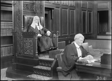 Royal Visit, May 1927. Hon Littleton Groom presiding as Speaker in the House of Representatives with the Clerk of the House in front.