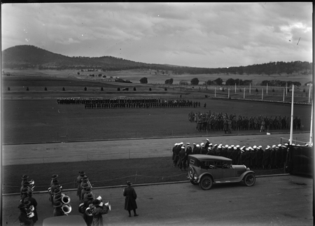 Royal Visit, May 1927. Official vehicles arriving outside Parliament House. Ranks of troops lined up for the Review.