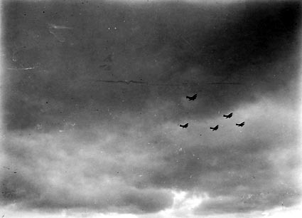 Two RAAF aircraft during 'fly past' for the opening of Parliament