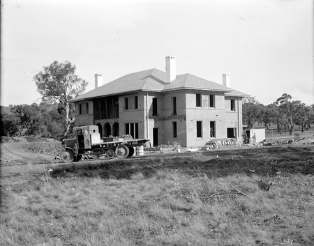Prime Minister's Lodge with builders truck  (note solid wheels on the truck) Adelaide Avenue Deakin