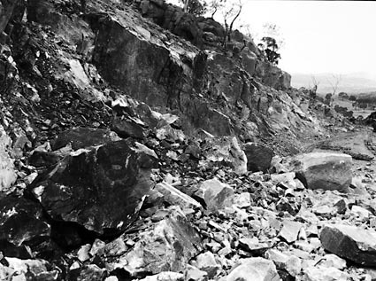 Brickworks quarry face with narrow gauge railway lines