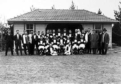 Ainslie Australian Rules Football team with officials