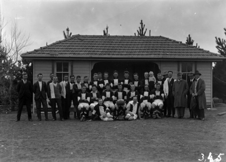 Ainslie Australian Rules Football Team with officials.