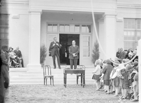 Sir John Butters speaking at the opening the Ainslie School in September 1927, with the Rt Hon Stanley Melbourne Bruce.
