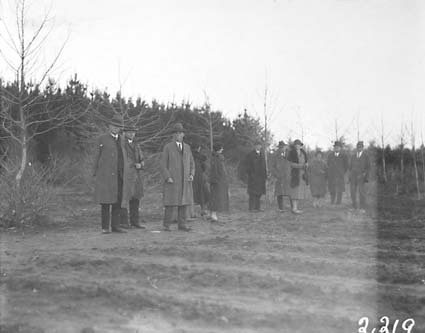 Group photographs taken at various points during visit by the Institution of Engineers for tree planting in Canberra Avenue