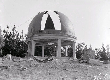 Construction, Mount Stromlo showing partially completed observatory dome.