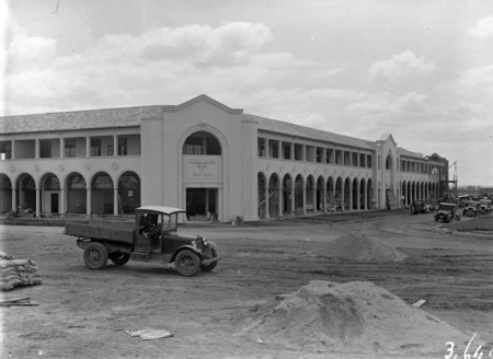 Melbourne Building from the south side of London Circuit, Civic Centre, with motor truck.