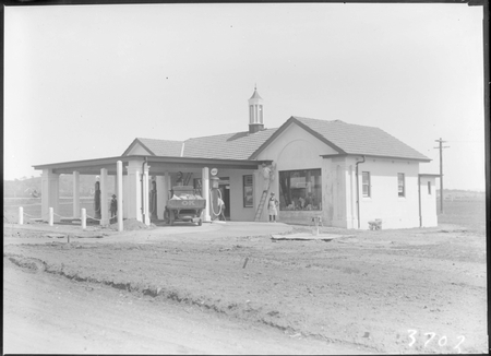 Brodies Garage Kingston with petrol pumps.
