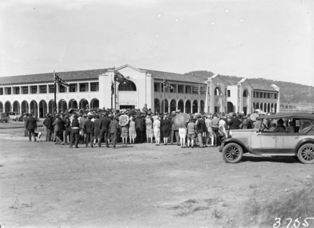Formal opening of Civic Centre by Prime Minister S M Bruce. Part of the crowd in front of the Sydney Building. Chevrolet car in front.