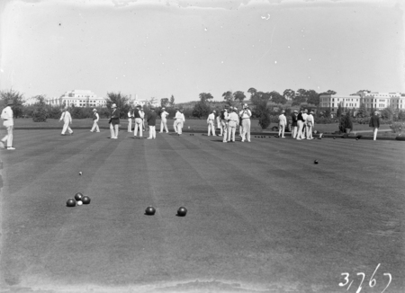 Visit by the Ashfield Bowling Club of Sydney. A game of bowls on Hotel Canberra greens.