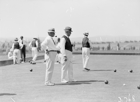 Visit by the Ashfield Bowling Club of Sydney. A game of bowls on Hotel Canberra greens.