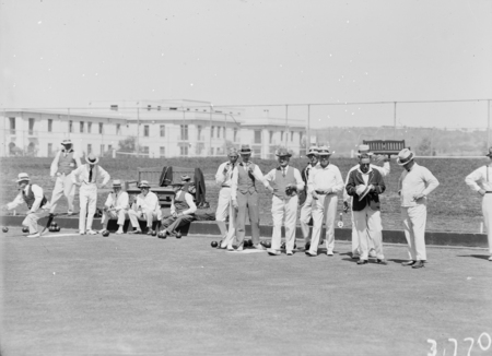 Visit by the Ashfield Bowling Club of Sydney. Game of bowls on the Parliament House greens.
