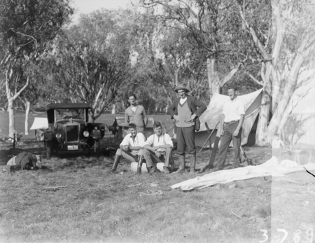 Five men in camp with motor car. Surveyors camp.