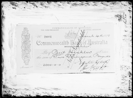 Cheque for 2000 pounds presented to Bert Hinkler, signed by Earle Page, Treasurer and Hon. S.M.Bruce, Prime Minister.