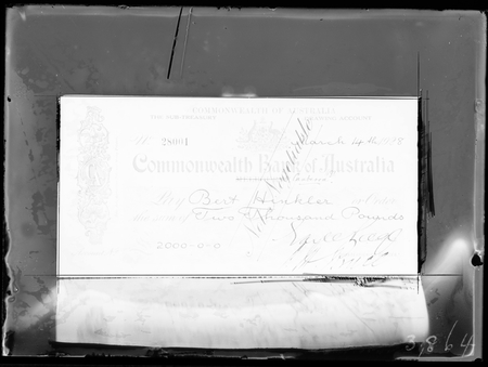 Cheque for 2000 pounds presented to Bert Hinkler, signed by Earle Page, Treasurer and Hon. S.M.Bruce, Prime Minister.