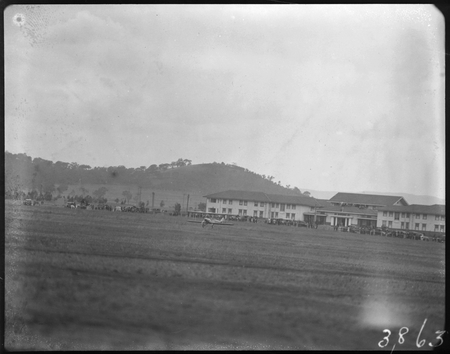 Bert Hinkler's Avro Avian aircraft landing on the Review Ground, opposite Hotel Kurrajong.