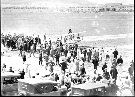 Landing of Captain W.N. Lancaster and Mrs Keith Miller aircraft "Red Rose" at the Review Ground opposite Hotel Kurrajong.