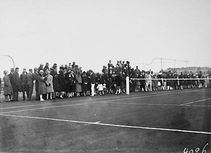 A crowd  at the opening of the new Canberra Tennis Association Central Courts  at Manuka.