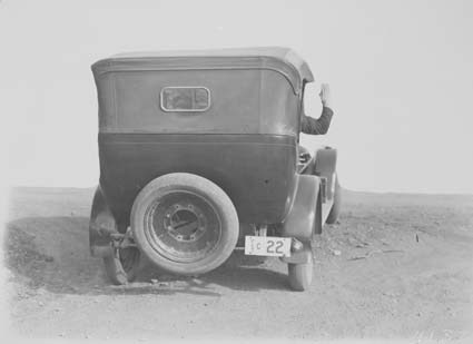 Traffic Signals. Demonstration of Traffic signals by driver of a motor car(stop signal)