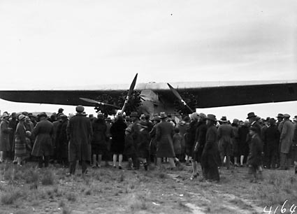  Kingsford Smith's Fokker Trimotor type FV111 B/3M aircraft, Southern Cross and crowd at the air force landing ground near Duntroon (now Fairburn)