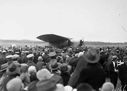  Kingsford Smith's Fokker Trimotor type FV111 B/3M , Southern Cross and crowd at the air force landing ground near Duntroon (now Fairburn)