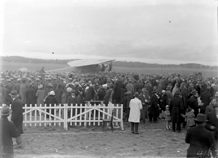  Kingsford Smith's Fokker Trimotor type FV111 B/3M aircraft, Southern Cross and crowd at the air force landing ground near Duntroon (now Fairburn)