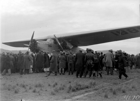  Kingsford Smith's Fokker Trimotor type FV111 B/3M aircraft, Southern Cross and crowd at the air force landing ground near Duntroon (now Fairburn)