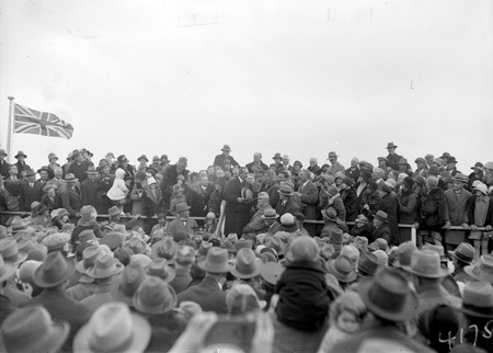 Prime Minister Bruce welcoming   Kingsford Smith and his crew