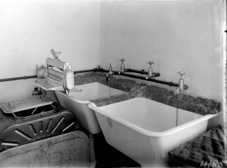 Laundry tubs  with a wringer type washing machine
