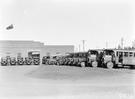 F.C.C. fleet of buses and motor cars outside Government Printing Office.