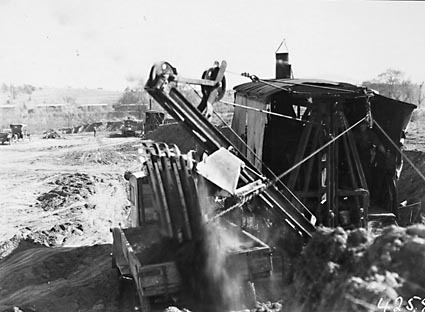 Keystone steam shovel loading a motor lorry