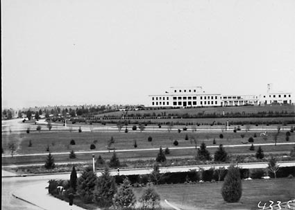 Parliament House from Hotel Canberra showing young trees