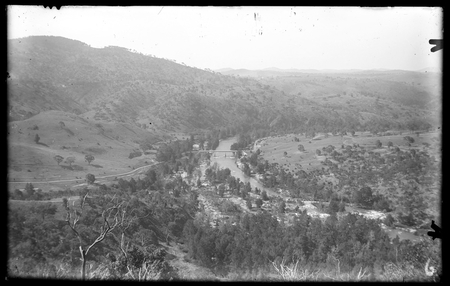Bridge over Murrumbidgee River, Cotter Pump House on left of bridge beside road. Casuarina Cunninghamiana and River Oaks lining river.