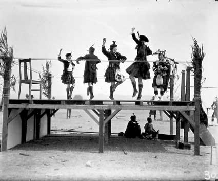Burns Club, Highland gathering at Acton Sports Ground-Highland fling dancers and piper