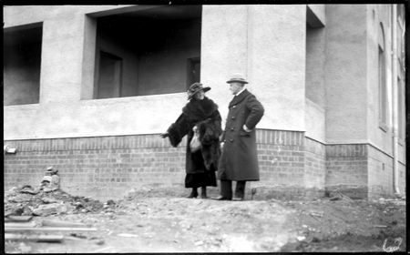 Right Honourable. Stanley Bruce and Mrs. Bruce at Parliament House (under construction).