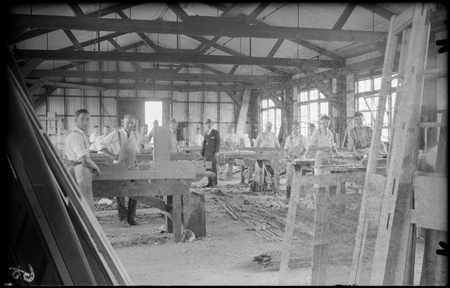 Interior of carpenters shop with workmen and foreman at Eastlake.