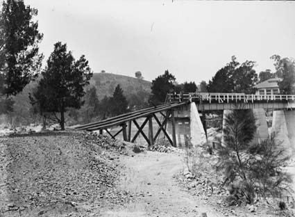 Flood damage to bridge over the Murrumbidgee River near the Cotter Pump House - 1922 floods - Reconstruction of western abutments