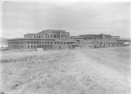 Parliament House under construction, from Queen Victoria Terrace.