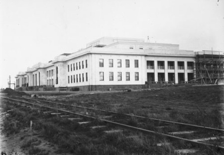 Parliament House under construction with the brickworks railway