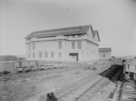 Kingston Power Station showing brickworks rail line with trucks.