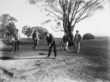 Five golfers on the 9th tee at the Acton Golf Club.