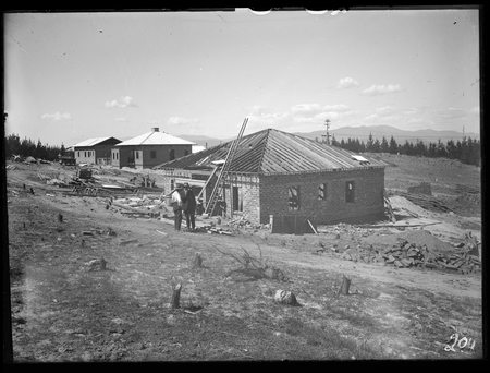 Cottages under construction at Mount Stromlo.