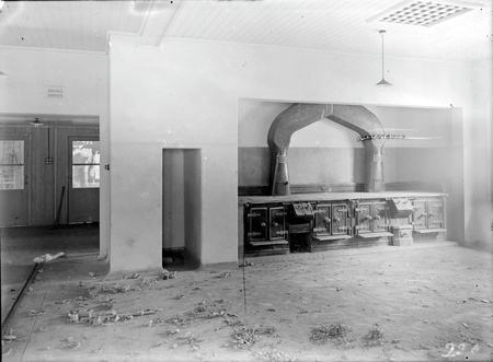Gorman House kitchen showing store room and cooking stoves