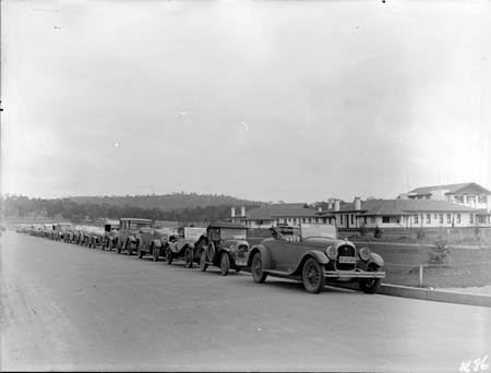 Line of Royal Automobile Club cars outside Hotel Canberra