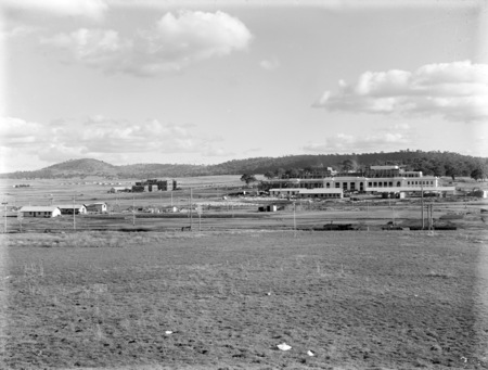 Parliament House and East Block under construction, Mt. Mugga at rear.