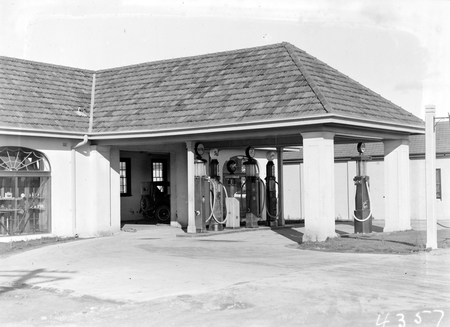 Brodies Garage with petrol pumps in Kingston.