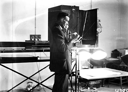 Photographic studio with large plan camera and operator