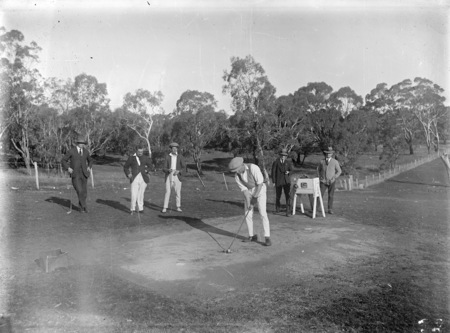 Six golfers at the second tee.