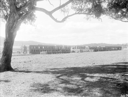Parliament House under construction from west of Camp Hill.